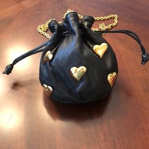 Black leather heart embellished bag
